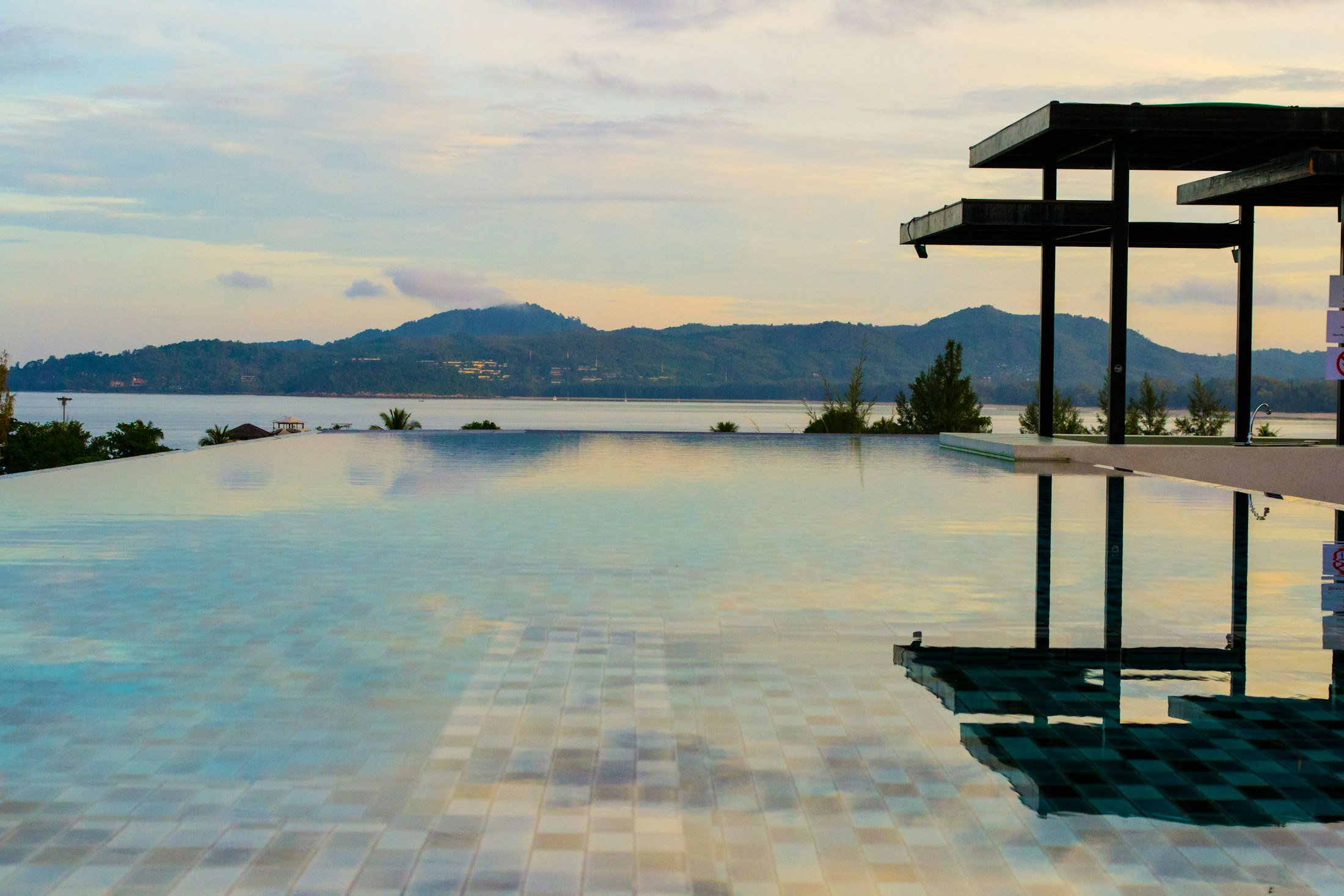 Villa with an infinity pool and palm trees